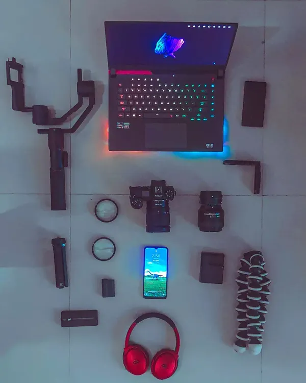 This is the arsenal. I use professional Nikon gear, stabilizers, and a powerful editing setup to ensure every photo and video is of the highest quality. The gear is a tool; the vision is what counts.
