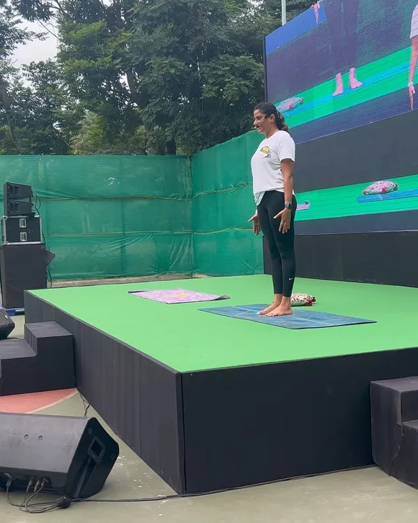 Standing on stage, ready to begin our group session for International Yoga Day. It was a beautiful opportunity to connect with so many fellow yoga lovers and share the practice that has given me so much.