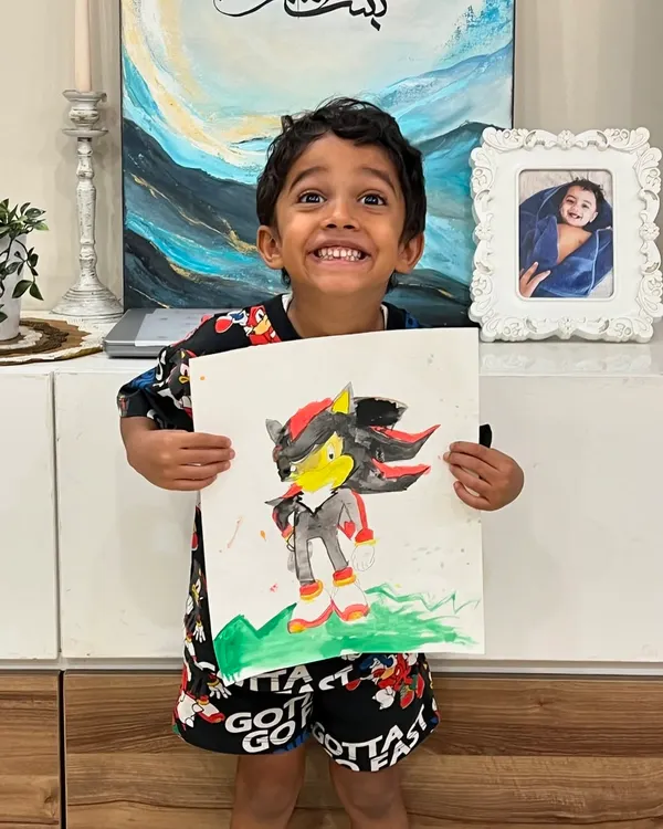 Look at that incredible smile! This is the moment it's all about, when a little artist sees their imagination come to life. This amazing Sonic painting is just one example of how we help kids explore their favorite characters and build confidence through art.