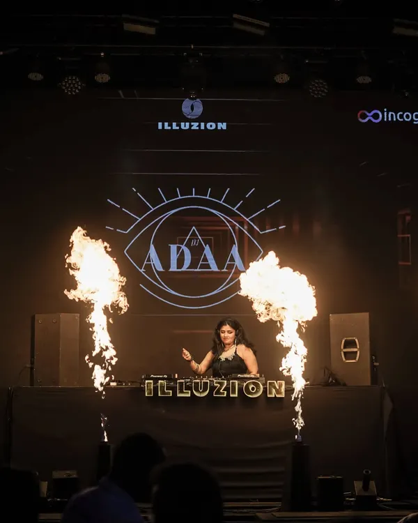 This is me in my element, commanding the stage at Illuzion. I bring the full experience to every gig, complete with pyrotechnics and high-energy visuals that make for an unforgettable night.