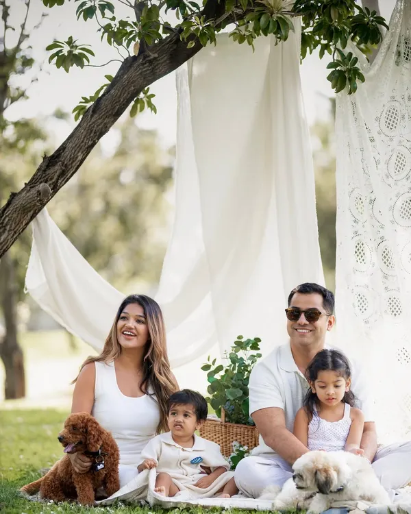 This is what a perfect day looks like. I created this beautiful boho picnic setup for a family session in one of Bangalore's lush parks, making sure to include their beloved pets in the portrait.