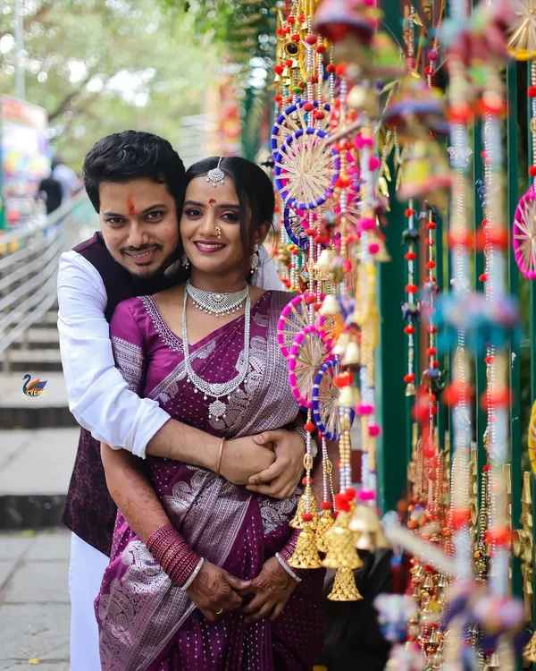 Hero Item. A joyful couple portrait from a pre-wedding shoot in Bangalore. I love using colorful backdrops to create vibrant, happy images that reflect the energy of the couple.