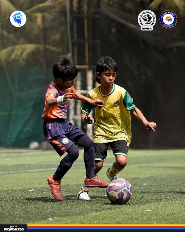 Every touch with intent, every frame filled with intensity. A snapshot of two young players battling for the ball in a U10 co-ed match in Mumbai.