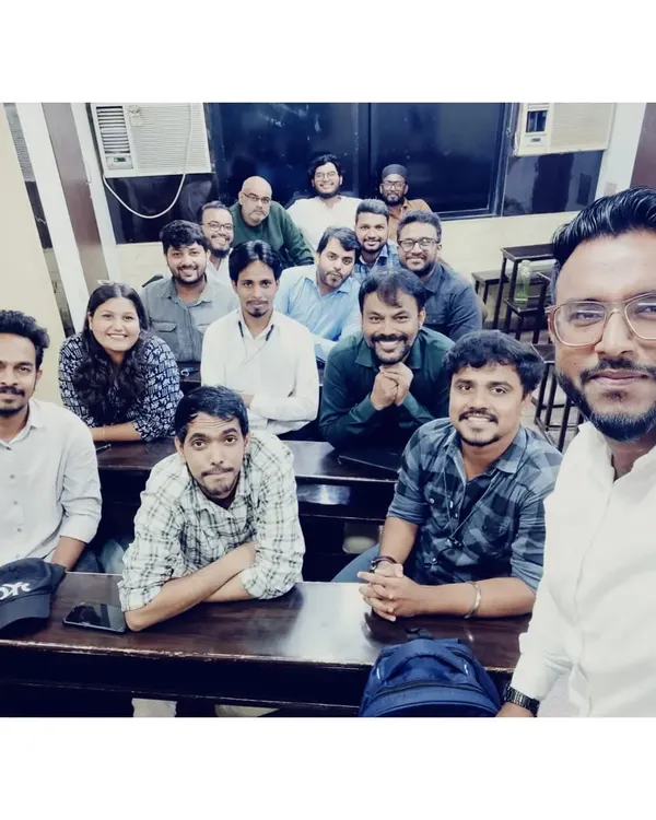A selfie capturing our team of dedicated teachers during a faculty meeting. We regularly collaborate to refine our teaching strategies and ensure the best learning outcomes for our commerce and science students.