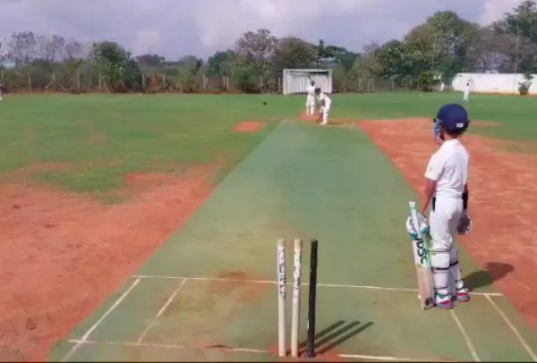 The view from the non-striker's end during a BCA Under-12 internal game. We create a real match environment to help young players understand game situations and pressure.