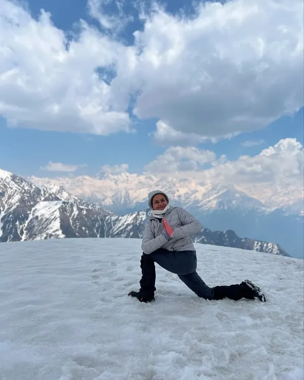At 13,000 feet on the Surya Top summit, the world feels vast and I feel connected to its strength. This is Ashwa Sanchalanasana, or equestrian pose, a moment of grounding and gratitude with the majestic Gangotri range before me. My Himalayan yoga treks are about finding these moments of power and peace.