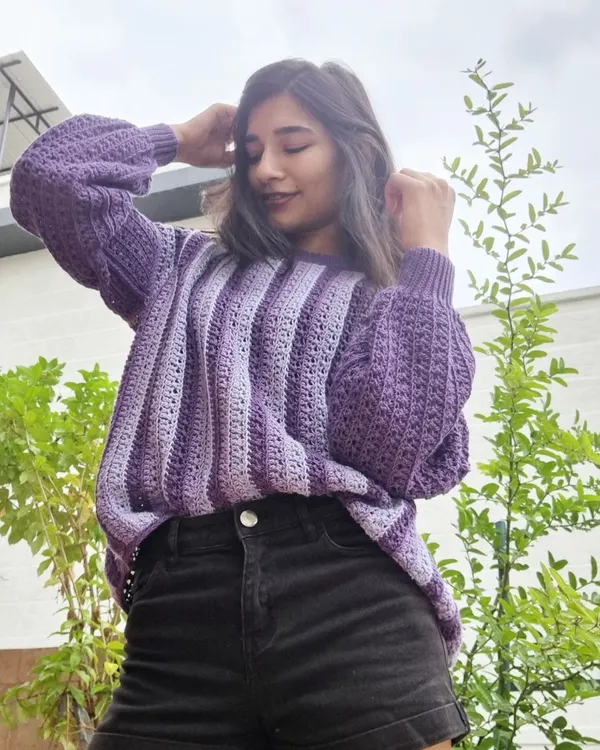 A close-up of my #RosemaryBlouse. I love the texture of the alpine stitch on the sleeves and the simple stripes on the body. I chose two shades of purple for a subtle, tonal look.