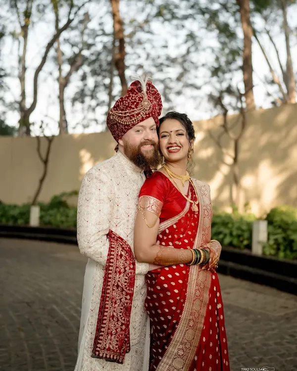 A portrait of pure happiness. We captured this beautiful smile during a relaxed moment, showcasing the couple's easy chemistry and the joy of their cross-cultural union.