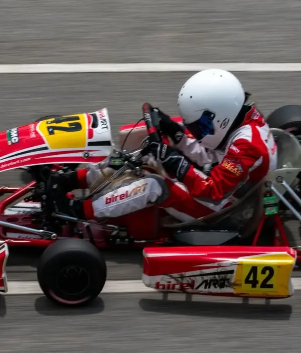 An overhead view of our BirelART kart at speed, demonstrating a clean line through the corner. This high-performance chassis is the foundation of our arrive and drive karting program.
