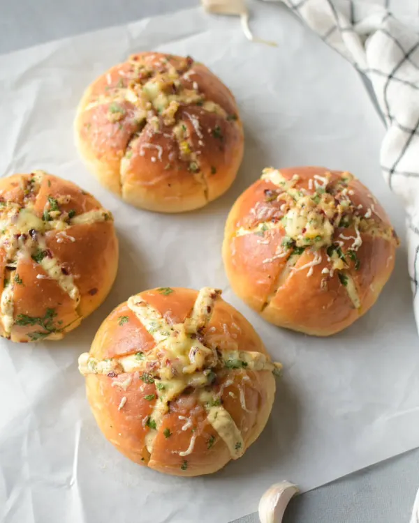 My bestselling Korean Cream Cheese Garlic Buns are back! These savory, cheesy, and garlicky treats are made with homemade eggless brioche and are incredibly addictive. Available in a box of 4.