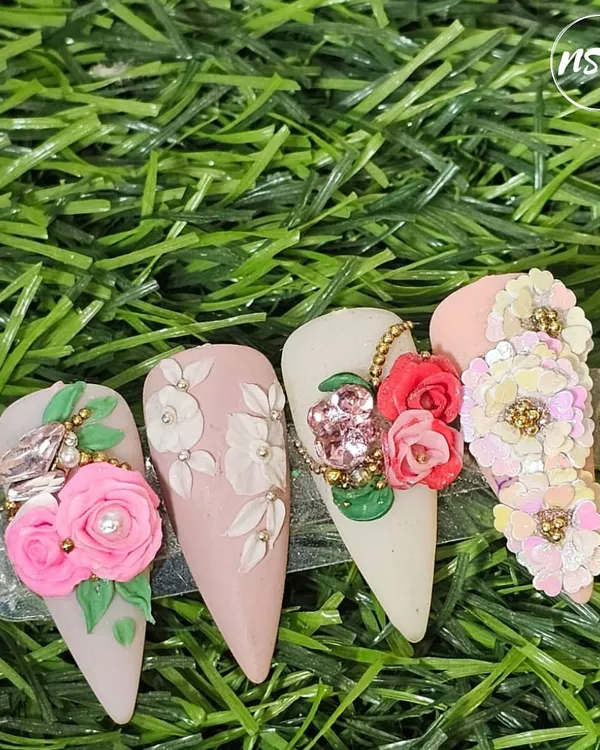 This is the level of artistry you can achieve. This intricate 3D floral design showcases the advanced, detailed techniques I teach in my diploma courses, turning your passion for nails into true craftsmanship.