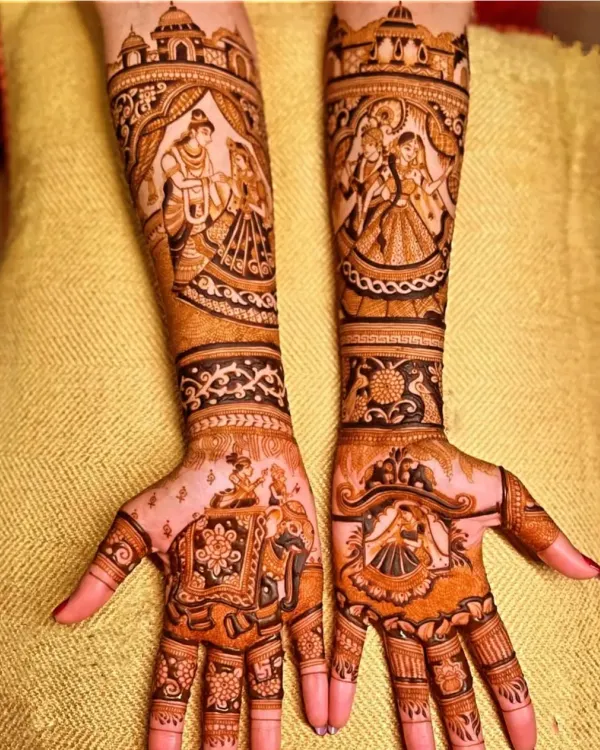 A classic love story of Radha and Krishna depicted on the forearms, with a doli scene on the palm. This is a popular choice for brides who want a blend of divine love and wedding tradition in their henna design.