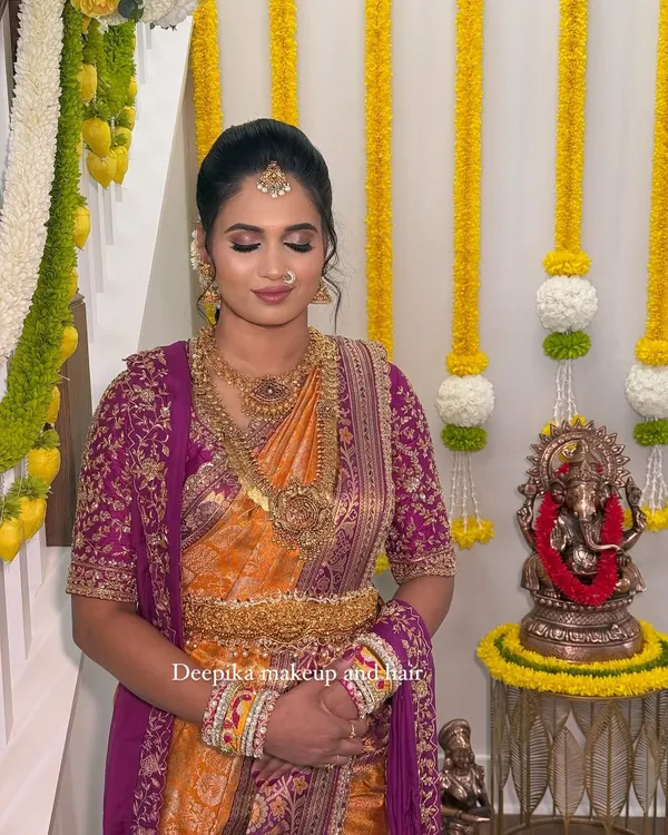 A beautiful, soft glam look for a client's housewarming ceremony in the USA, complete with a traditional saree and jewelry.