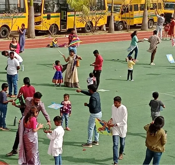 The sky above our school grounds filled with colorful kites during our Makar Sankranti celebration. This festive event brought students and parents together for a day of joy, community, and high-flying fun.