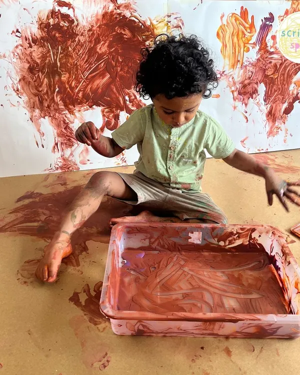 This is the magic of process art. We provide the safe, non-toxic paints and the space, and your child leads the way, completely absorbed in the sensory experience of creation. It's moments of focused joy like this that build confidence and a love for learning.
