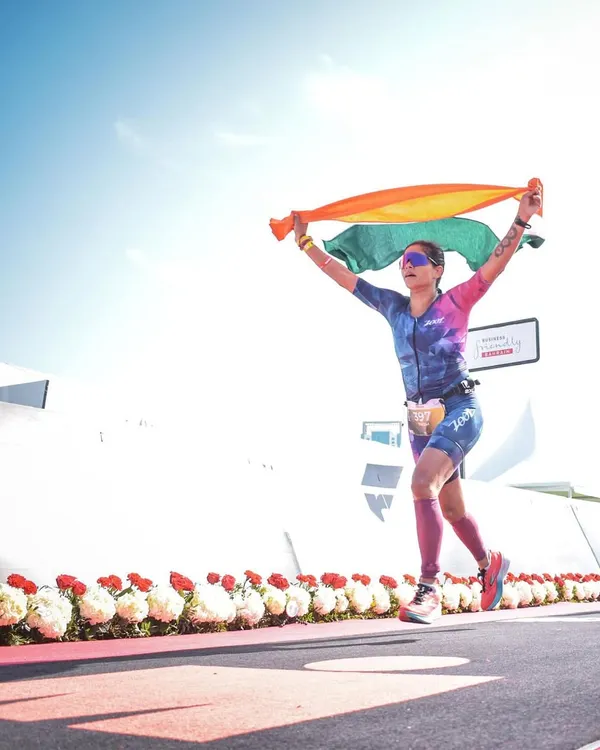 The finish line at Ironman Bahrain 70.3. I've waited a long time to carry the Indian flag across an international finish line, and it was worth every second of the struggle. This is a moment of pure, unadulterated joy.
