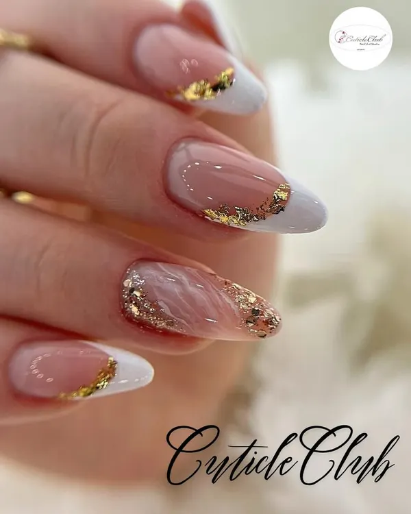 A perfect example of a modern French manicure. I used a classic white tip on an almond-shaped nail and elevated it with a touch of gold foil for a chic and luxurious finish.