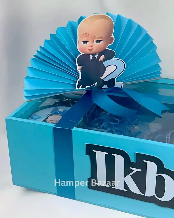 A close-up of our popular Boss Baby hamper, personalized for Ikbir's 2nd birthday. The sturdy pinewood box can be reused later.