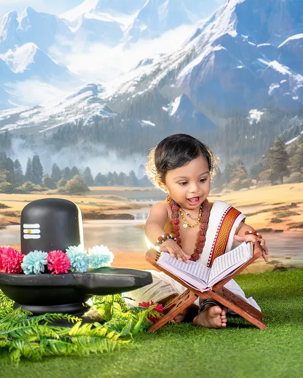 Against the backdrop of the mighty Himalayas, we captured these magical moments of a little Shiv Bhakt. It's an honor to bring such a divine vision to life in my studio.