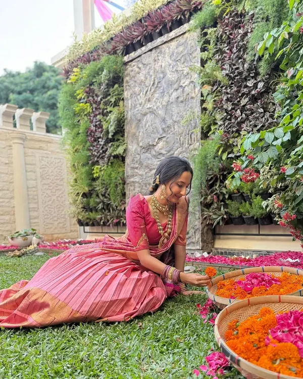 A beautiful moment captured with a lehenga crafted from a light pink Kanchi saree. The original Paithani border was preserved and repurposed, creating a timeless outfit that honors tradition while feeling fresh and elegant.