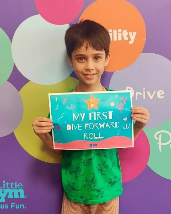 That's how we roll. Celebrating milestones is an important part of the journey. We are so proud of this grade schooler for nailing his first dive forward roll. A fantastic achievement.