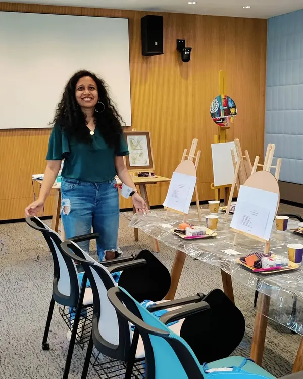 Setting up for a creative art workshop with the employees at Google. I provide all the materials, including easels, canvases, and paints, so the team can dive right into the artistic experience.