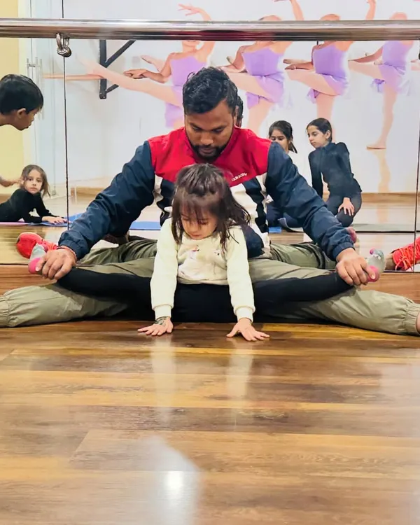 This is what dedication looks like. I work closely with every student, even my youngest three-year-old champions, to build incredible flexibility and strength safely. Personal attention is key to my coaching.