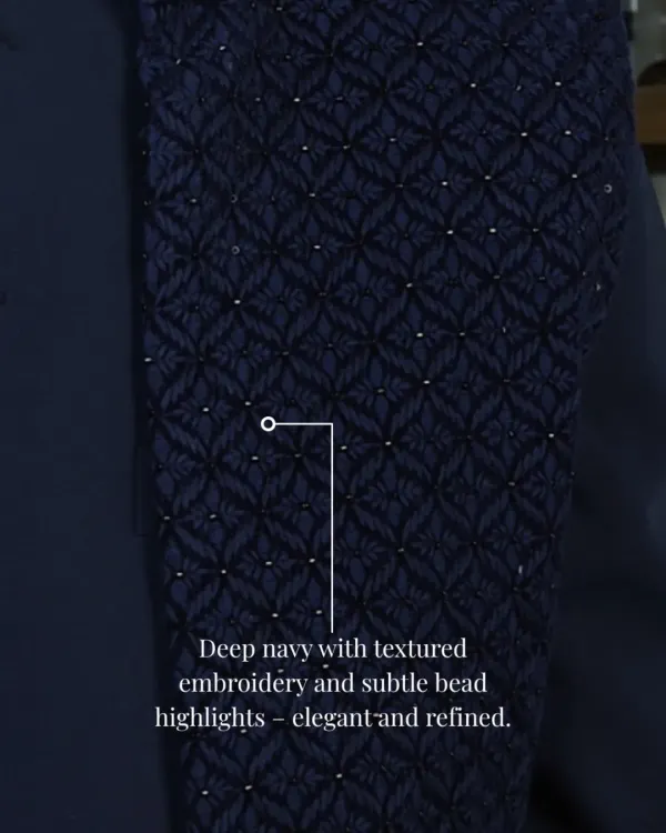A close-up of the deep navy fabric used in my Indo-Western sets. The textured embroidery and subtle bead highlights create a refined and elegant finish.