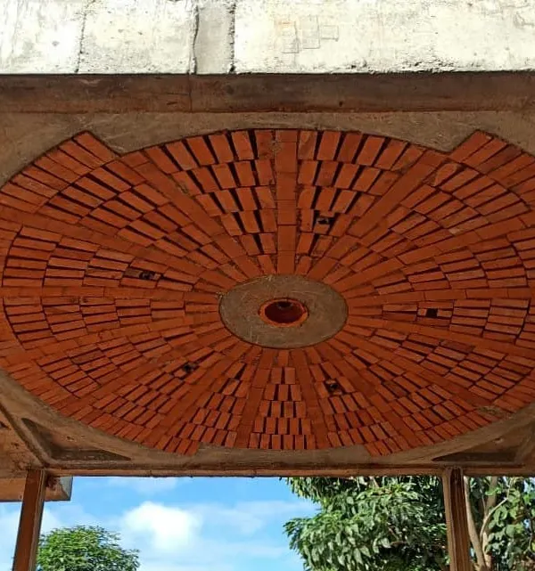 This brick dome is a signature example of our 'True Ceiling' work. The intricate radial pattern is not just decorative; it's a structural slab that showcases the beauty of exposed brick and provides excellent insulation.