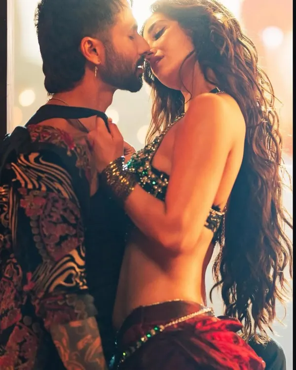 A fiery moment from the 'O Romeo' music video. The hairstyling for Disha Patani here was all about creating voluminous, touchable waves that moved with her and added to the romantic energy of the scene.