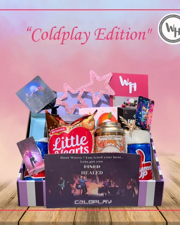 Chill vibes, warm gifts. This is my "Coldplay Edition" hamper, inspired by the band's music. It includes Little Hearts biscuits, themed cards, and other fun goodies.