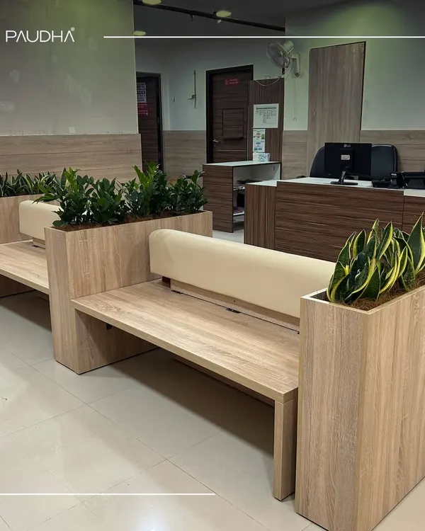 This is my custom-designed seating for a healthcare facility. The benches have integrated planters, seamlessly blending furniture and nature to create a waiting area that is functional, beautiful, and calming.