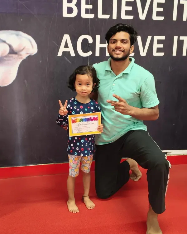 A proud moment! We love celebrating our students' achievements with a certificate to mark their progress.