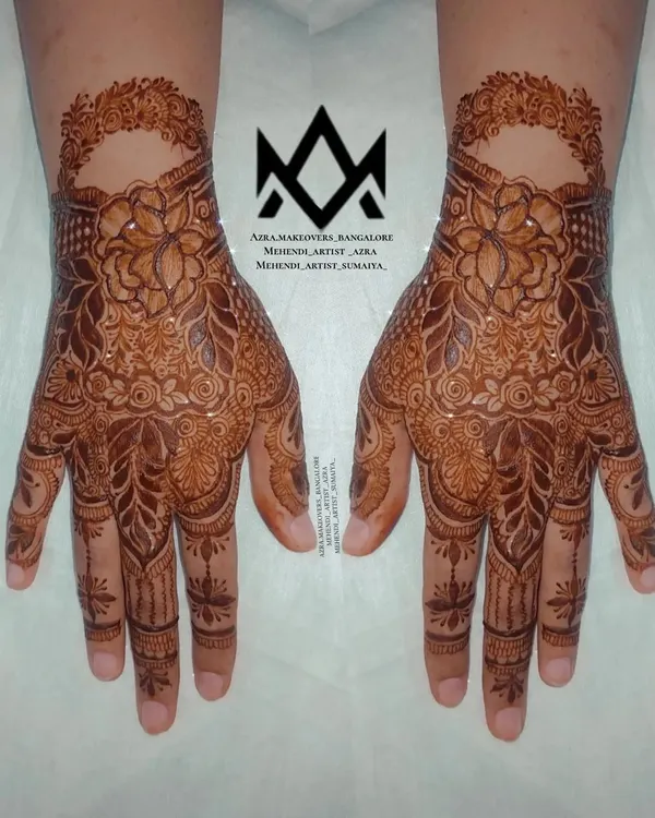 A beautiful and unique design for Karva Chauth, featuring a floral pattern with a negative space cuff.