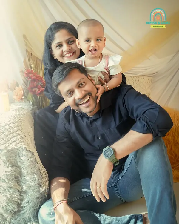 Pure happiness in one frame. We love capturing these playful family moments where everyone's personality shines through.