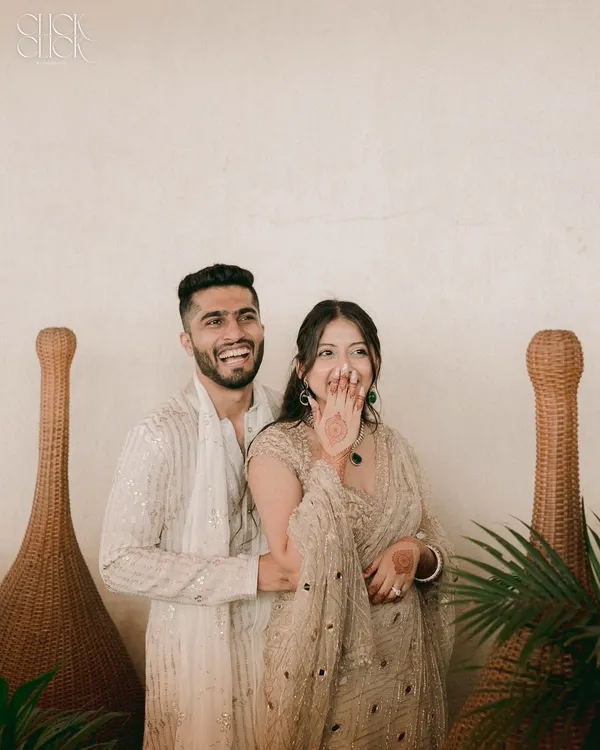 This is what it's all about for us. Not the perfect pose, but that split second of pure, unscripted laughter between two people in love. For Dolly and Kapil, we just let them be, and this magical moment happened.