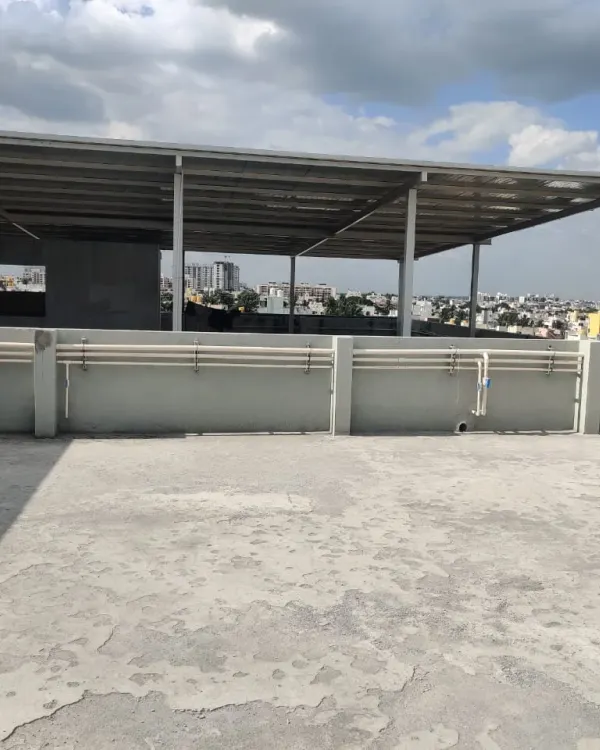 This is a typical starting point for many of my projects: a bare concrete rooftop terrace. It has a lot of potential but is currently unused and exposed.