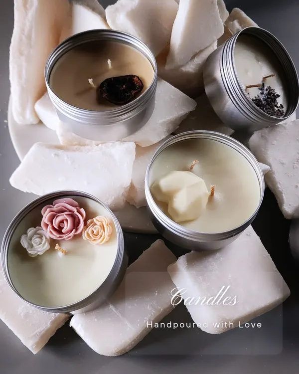 This is the heart of Fika, a collection of my hand-poured artisan candles. I craft each one with a blend of natural soy wax and pure essential oils, and top them with decorations like wax roses, dried lavender, and citrus slices. They are designed to be a small work of art for your home.