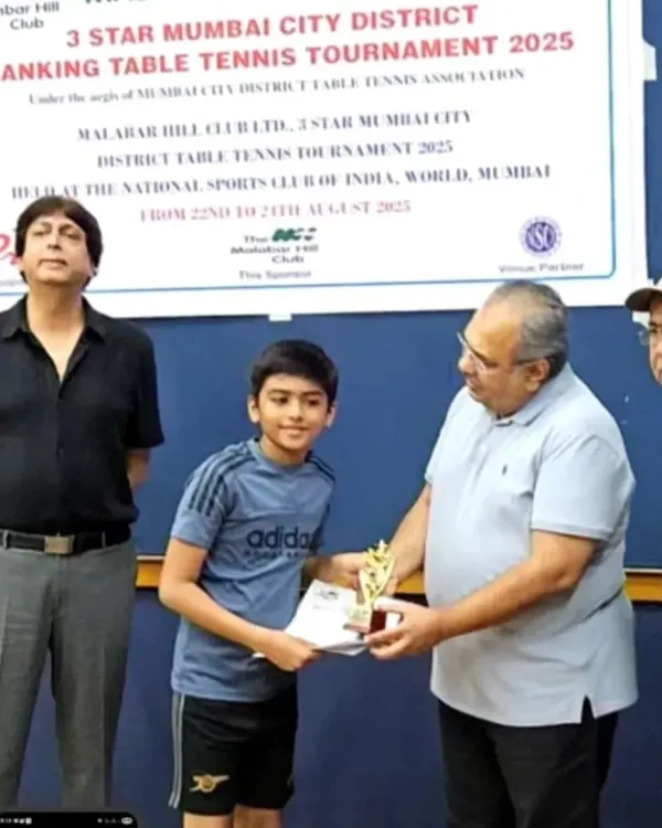 One of our young champions, Arnav Bhatter, receiving his trophy for reaching the semi-finals in the U-11 Boys category at the 3-Star District Ranking Tournament.