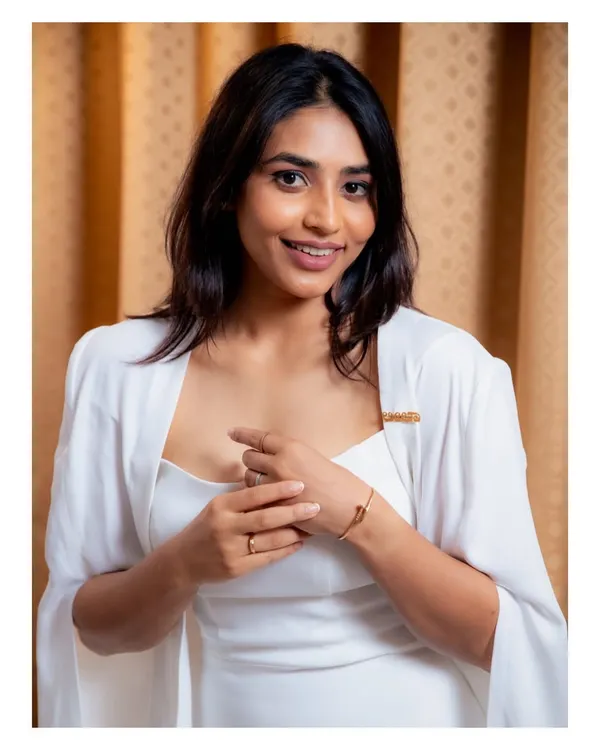I was so proud to see Sapthami Gowda accept her award for 'Kantaara' in this white cape gown I designed. White is a special color for her character, and creating this powerful, elegant look for her was a memorable experience.