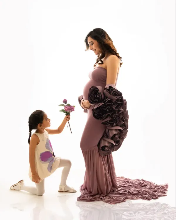 Such a heart melting moment between mother and daughter. Including your children in a glam session makes for truly special memories, like a little princess honoring her queen.