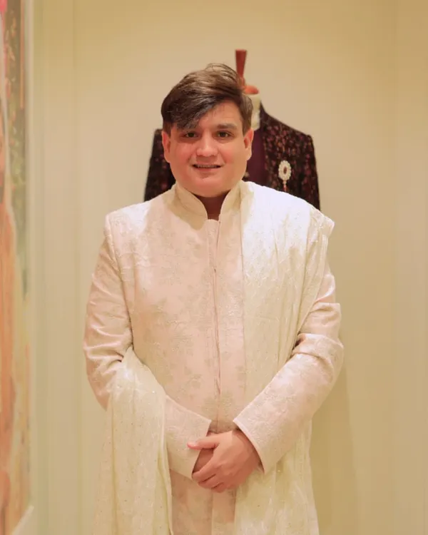 Presenting a look from the 'Baarat' collection by Tasva. This elegant sherwani in a subtle off white is a perfect example of modern Indian menswear, blending traditional silhouettes with contemporary comfort and style.