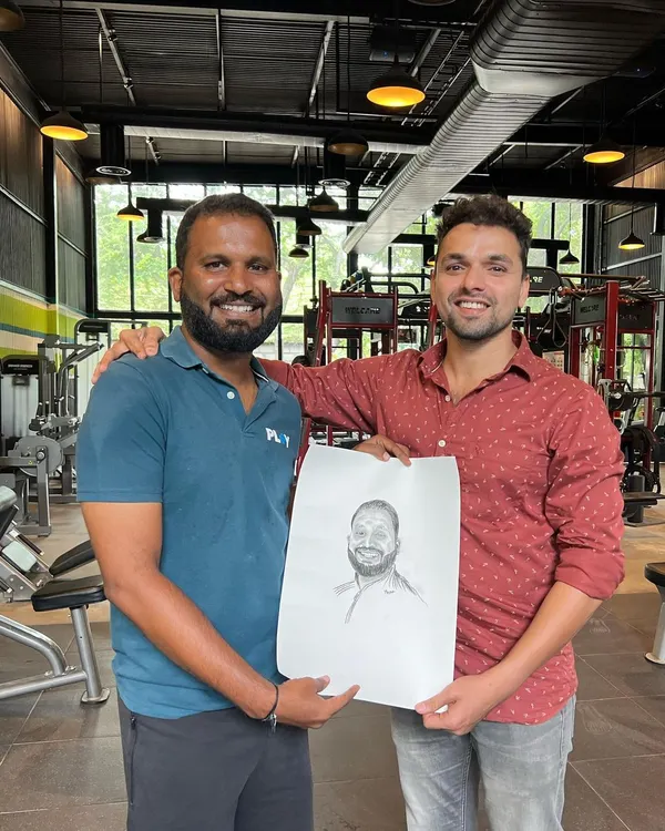 Hero Item. There's no greater feeling than seeing a client's smile when they receive a piece of art made just for them. This is why I do what I do, turning moments into timeless charcoal portraits.