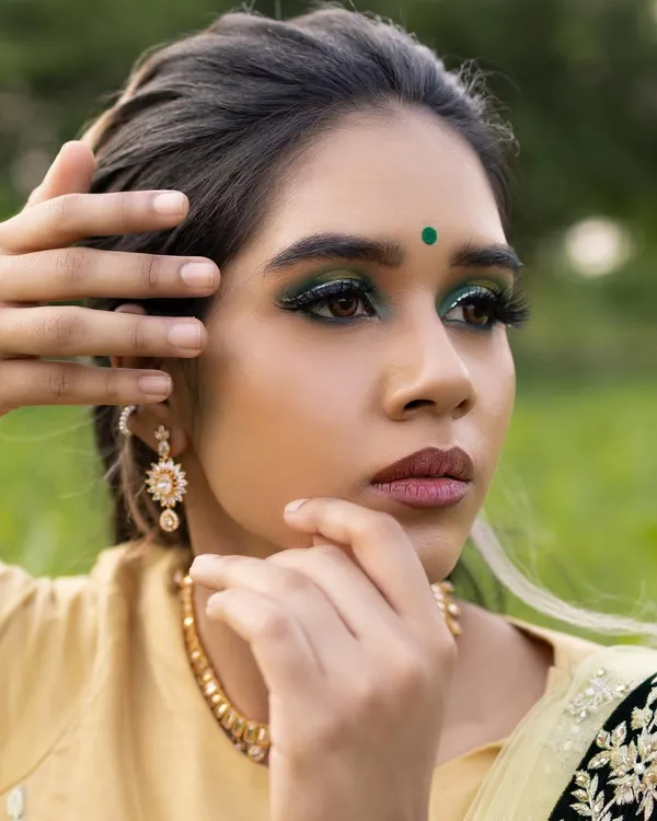 This look, taught in my pro MUA class, focuses on a dramatic green smokey eye. We explore how to use bold colors to create high-impact, editorial-style makeup.