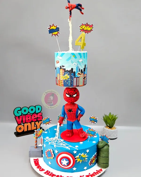 With great power comes a great cake. This Spiderman anti-gravity cake features two tiers of action, with Spidey figurines mid-air and ready for adventure.