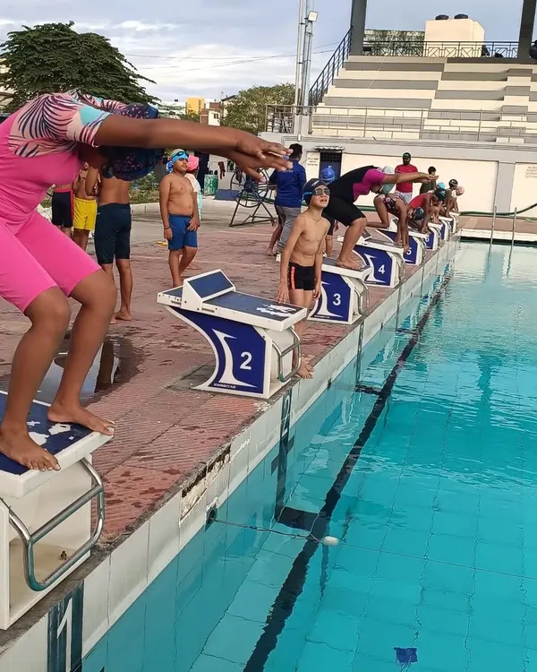 On your marks! My swimmers are poised on the starting blocks, ready to dive in for a time trial. Practicing starts under pressure is key to gaining an edge in a real race.