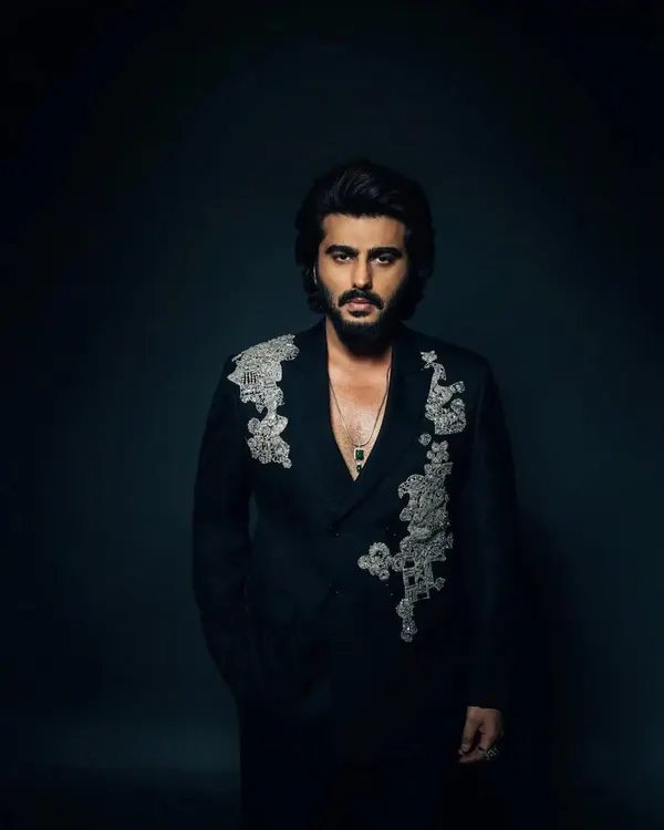 Styling Arjun Kapoor for the NMACC opening in a custom-made double-breasted black suit by the incredible Anamika Khanna. The silver embroidery on the shoulders adds a touch of modern royalty.