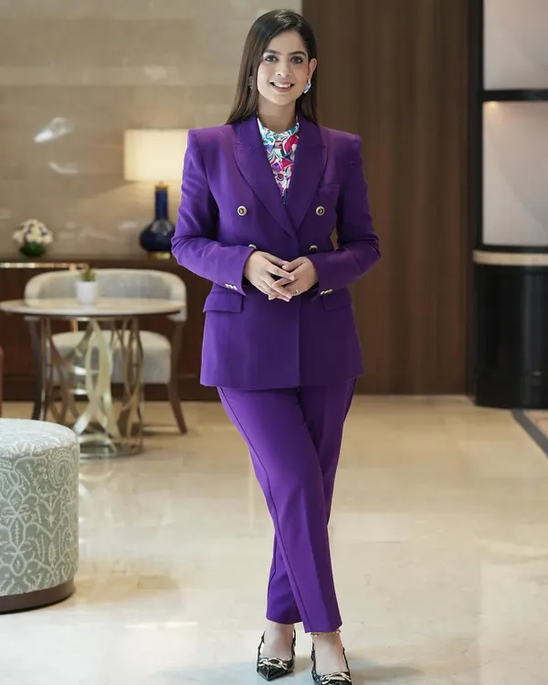 Basking in hues of purple. This formal blazer and pantsuit was my choice for a corporate event, projecting confidence and style.