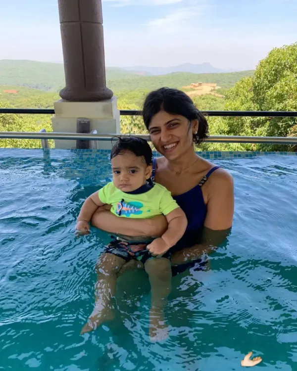 A mother's reassuring hold is the best foundation for building water confidence.