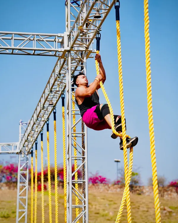 Rope climbs are a classic obstacle course challenge that tests your upper body strength and technique. Here I am at The Yoddha Race, using a secure leg lock to conserve arm strength for the rest of the race.